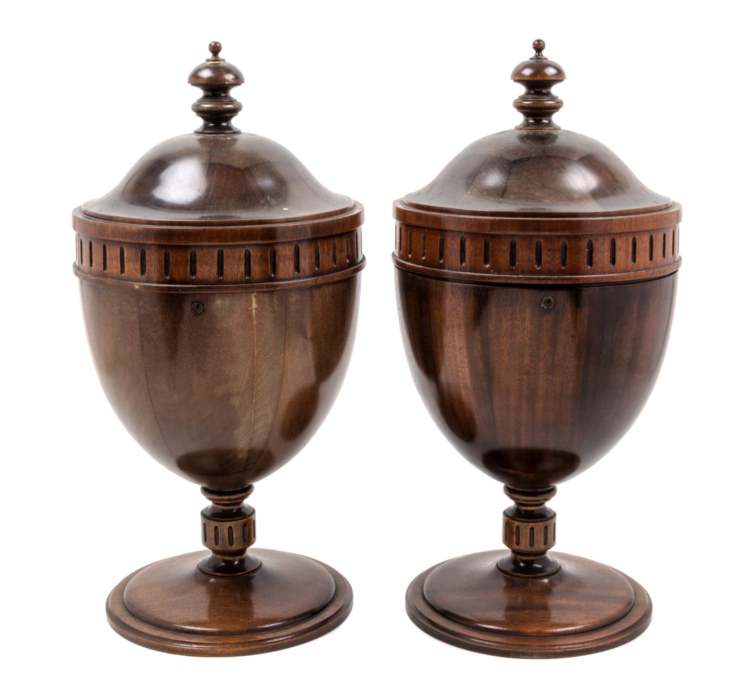 A Pair of George III Style Mahogany Cutlery Urns Height 22 inches.