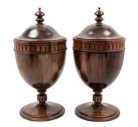 A Pair of George III Style Mahogany Cutlery Urns Height 22 inches.