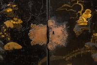 A Chinese Black and Gilt Lacquered Cabinet on Stand