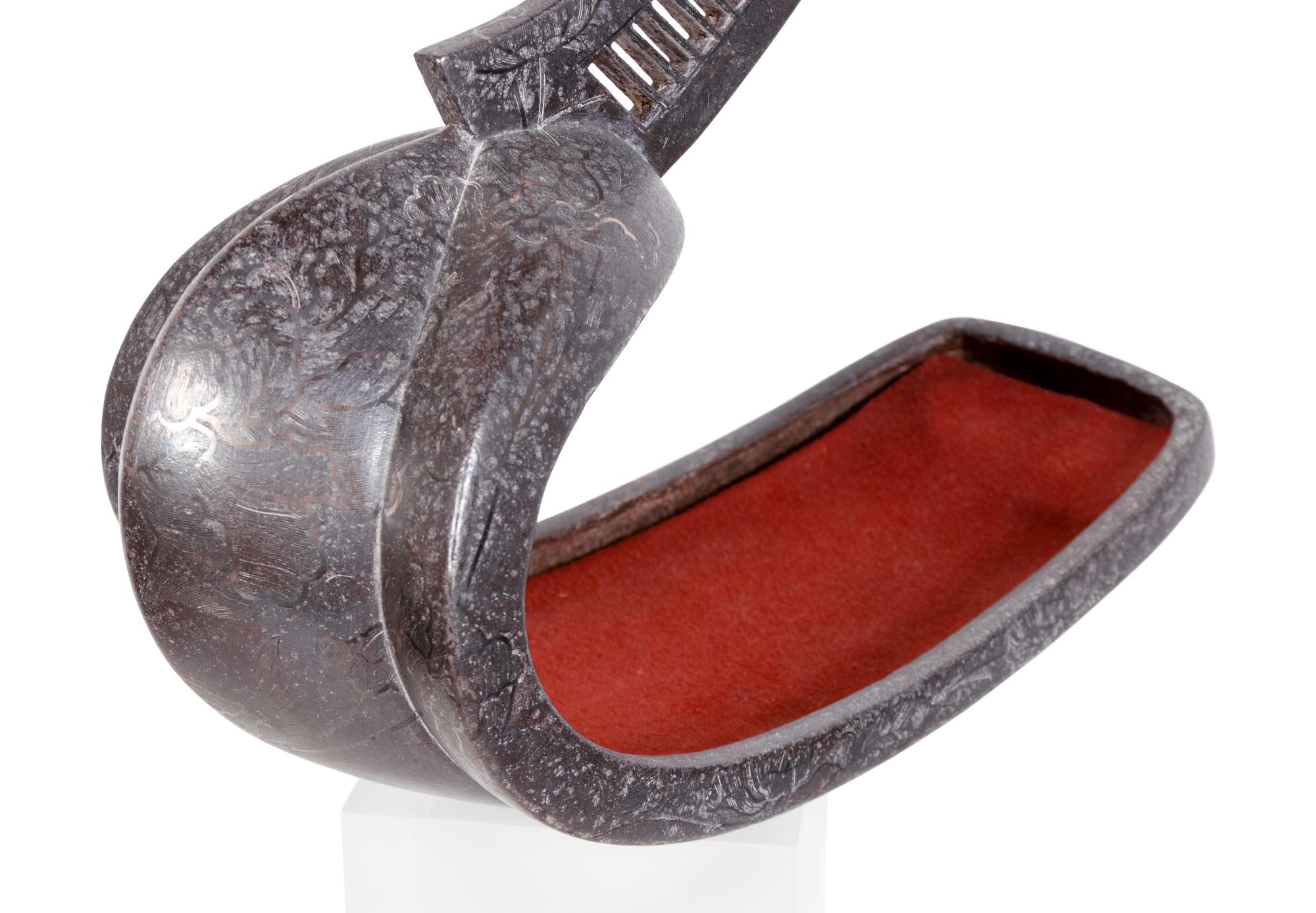 A Japanese Bronze Stirrup