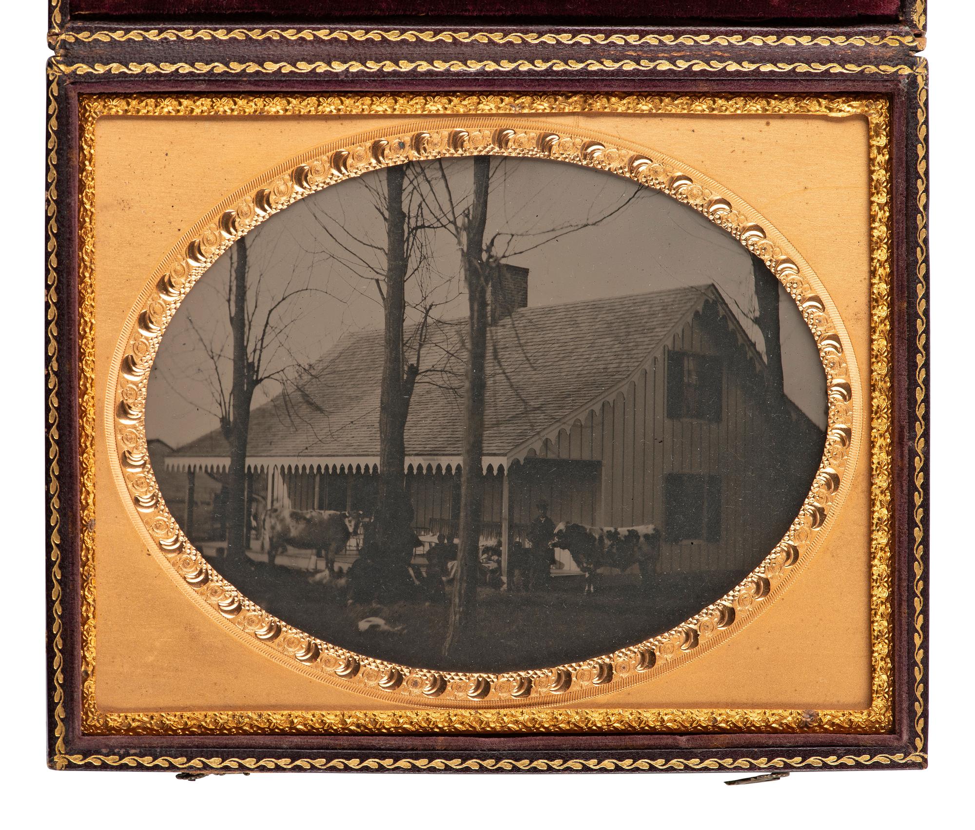 [EARLY PHOTOGRAPHY - AFRICAN AMERICANA]. Half plate ambrotype of an African American family at a farm.