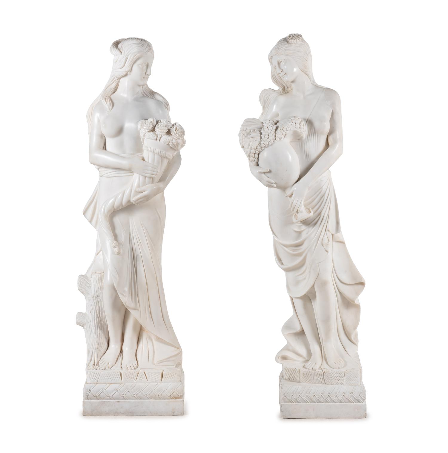 A Pair of Carved Marble 'Four Seasons' Figures
