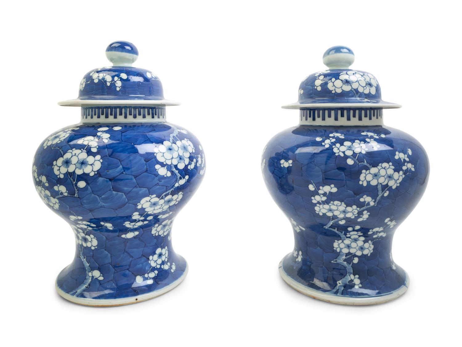A Pair of Chinese Blue and White Porcelain 'Ice Crackle and Prunus' Baluster Jars and Covers