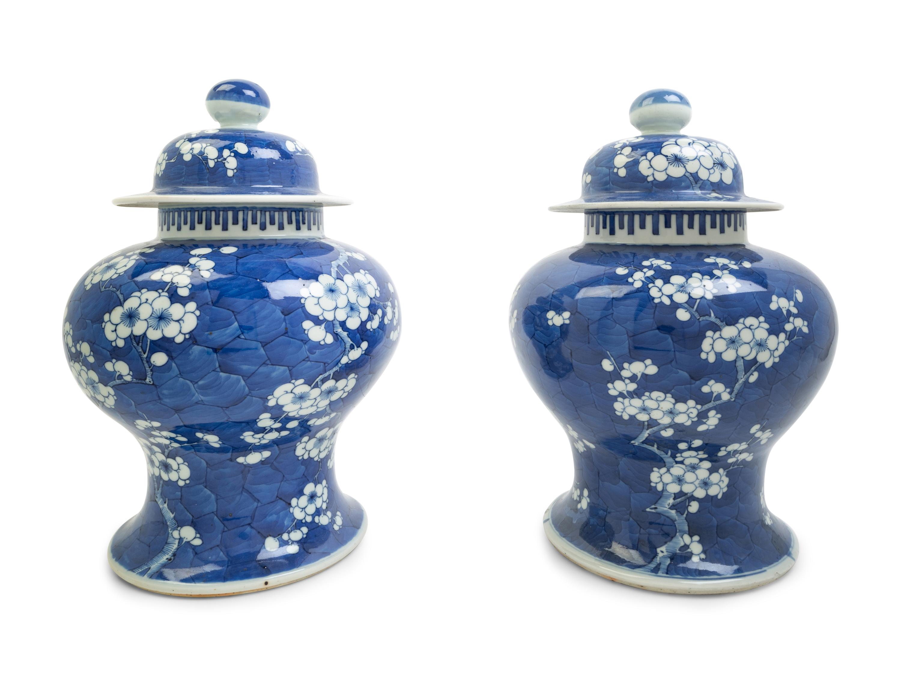 A Pair of Chinese Blue and White Porcelain 'Ice Crackle and Prunus' Baluster Jars and Covers