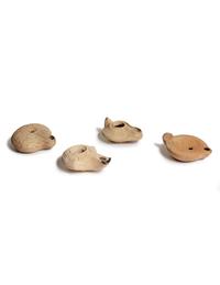 Four Roman Molded Terra Cotta Oil Lamps