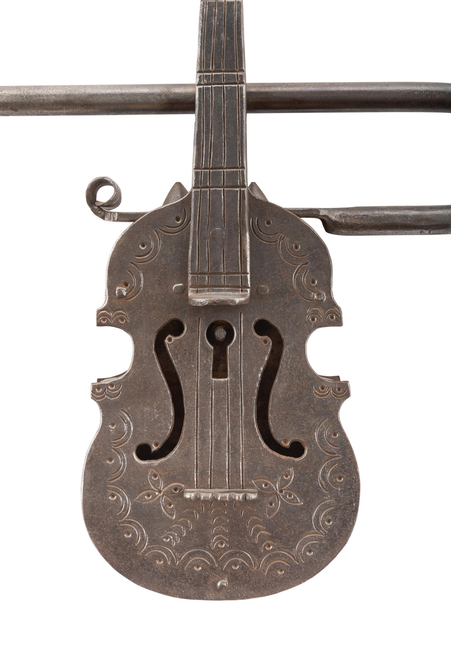 A Continental Engraved and Wrought Iron Violin-Form Padlock