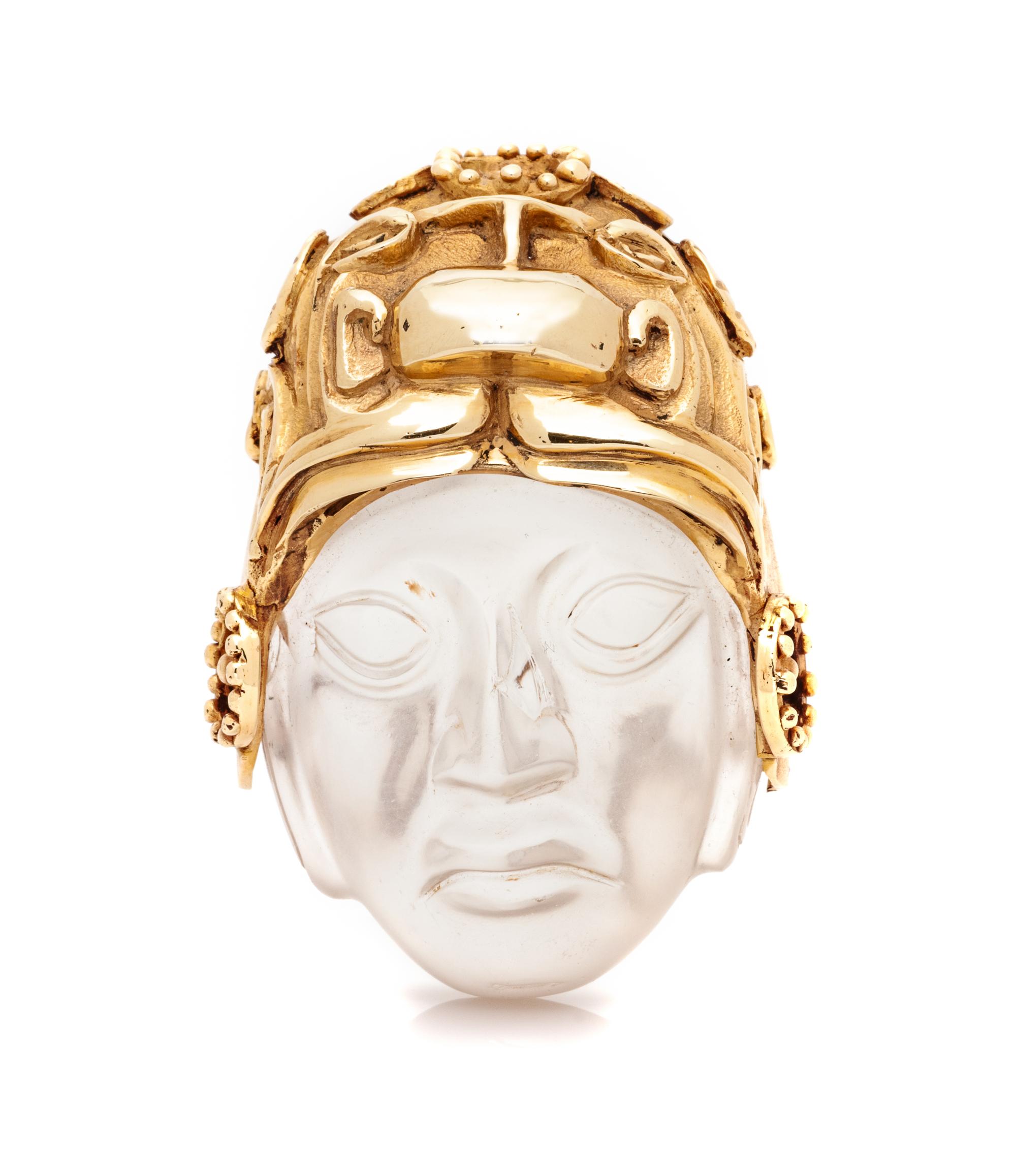 A Yellow Gold and Rock Crystal Mesoamerican Motif Pendant,