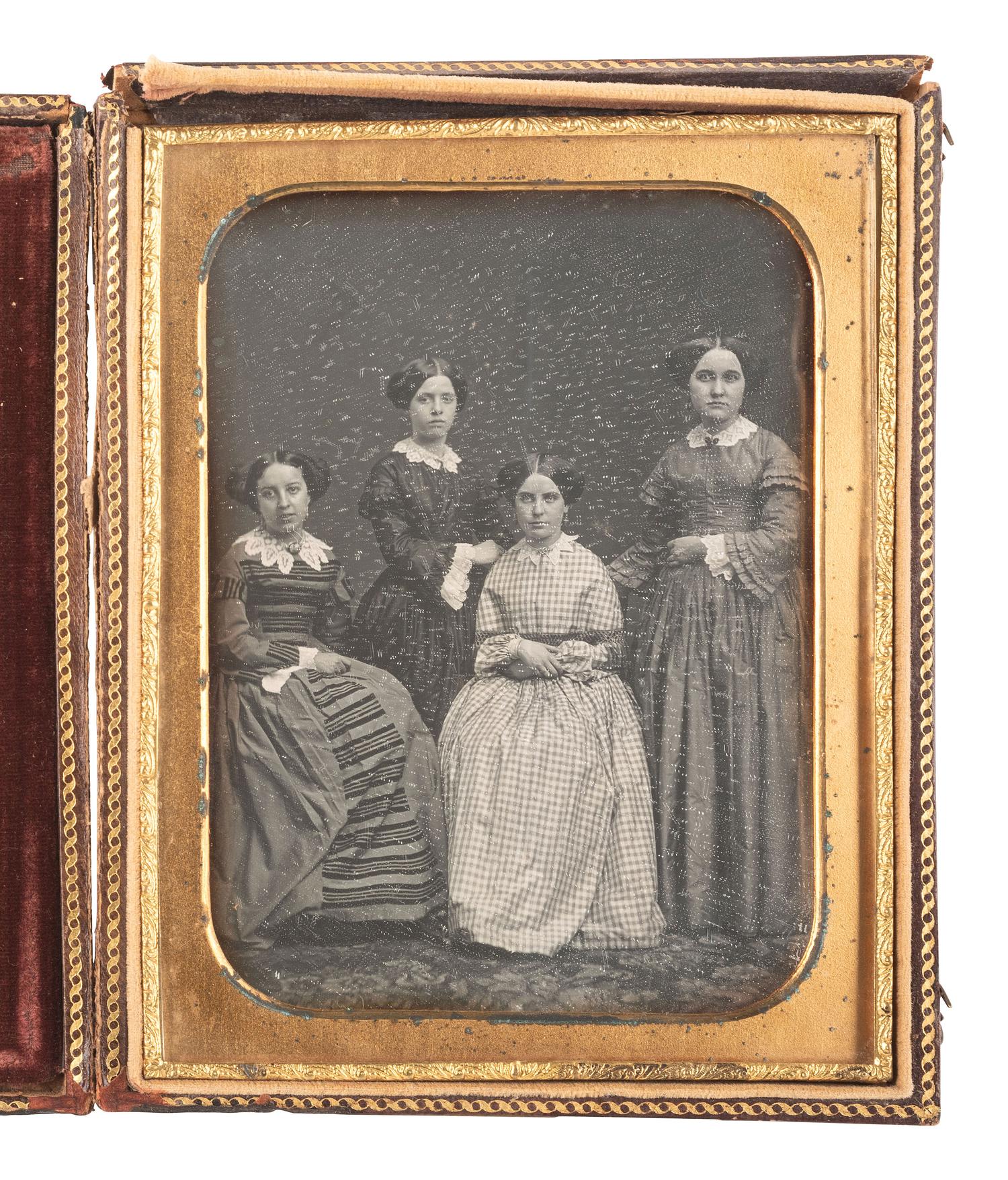 [EARLY PHOTOGRAPHY]. A pair of half plate daguerreotypes featuring groups of women, incl. a portrait of a large female class and a smaller group portrait by MEAD BROTHERS, NY.
