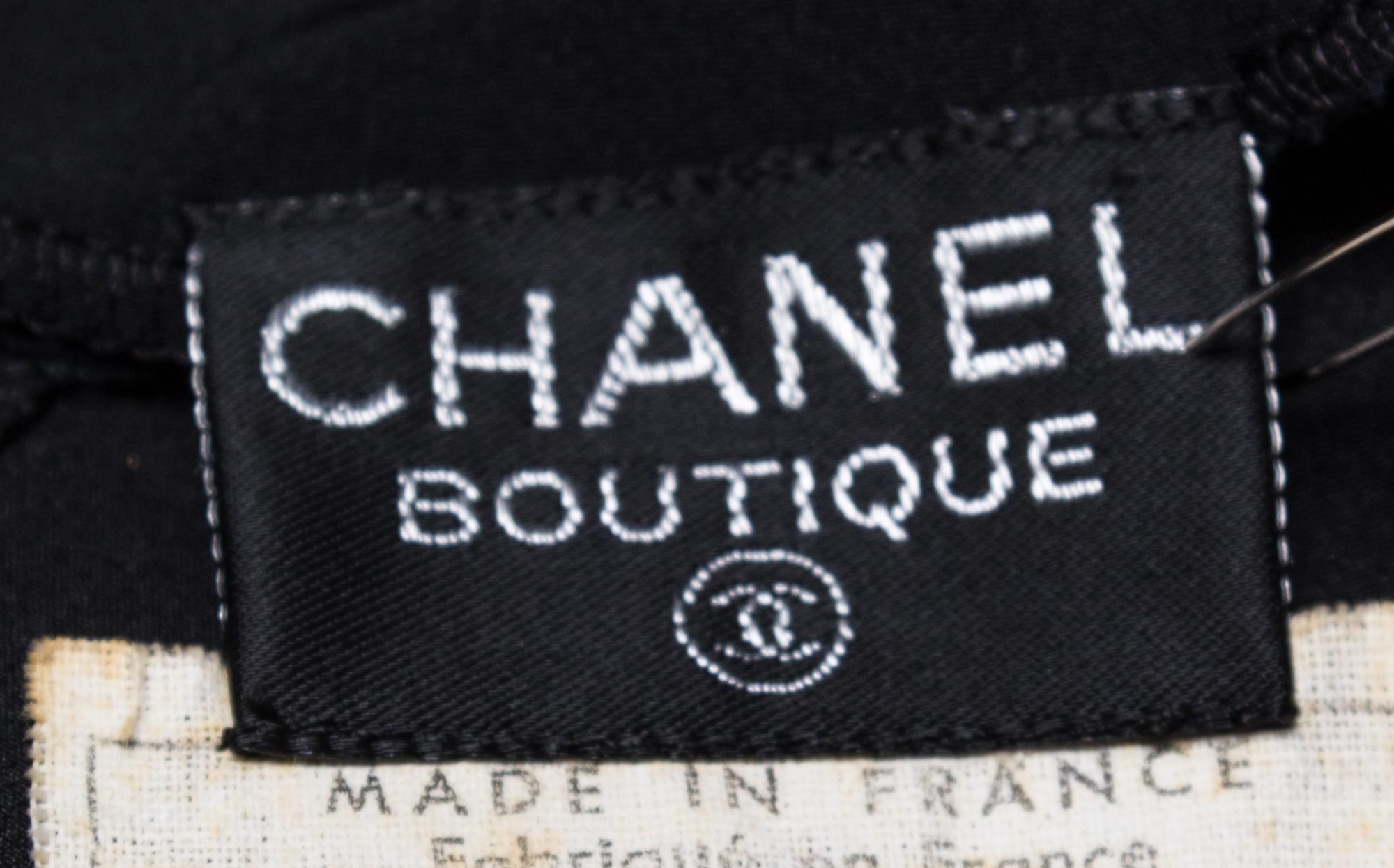 A Chanel Black Skirt Ensemble, Blouse size 34.