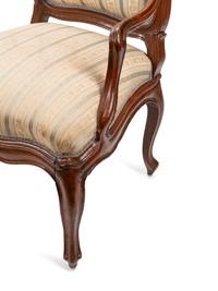A Pair of Louis XV Walnut Fauteuils