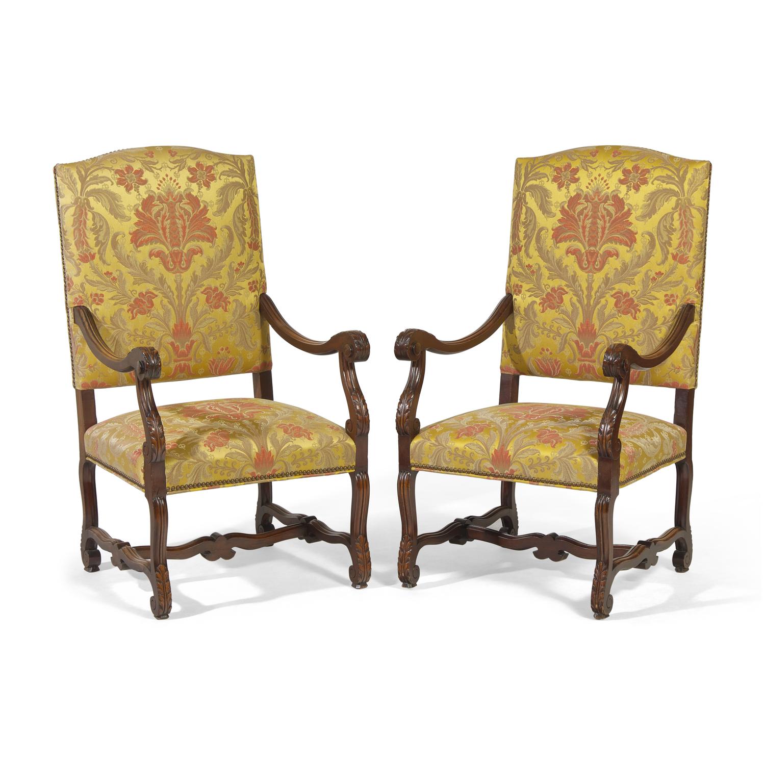 A Pair of Louis XIV Style Carved Mahogany Fauteuils
