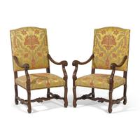A Pair of Louis XIV Style Carved Mahogany Fauteuils