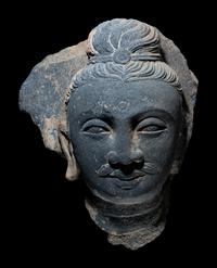 A Gandharan Grey Schist Head of Buddha