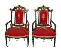 A Set of Four Black and Polychrome Chinoiserie-Decorated Chairs