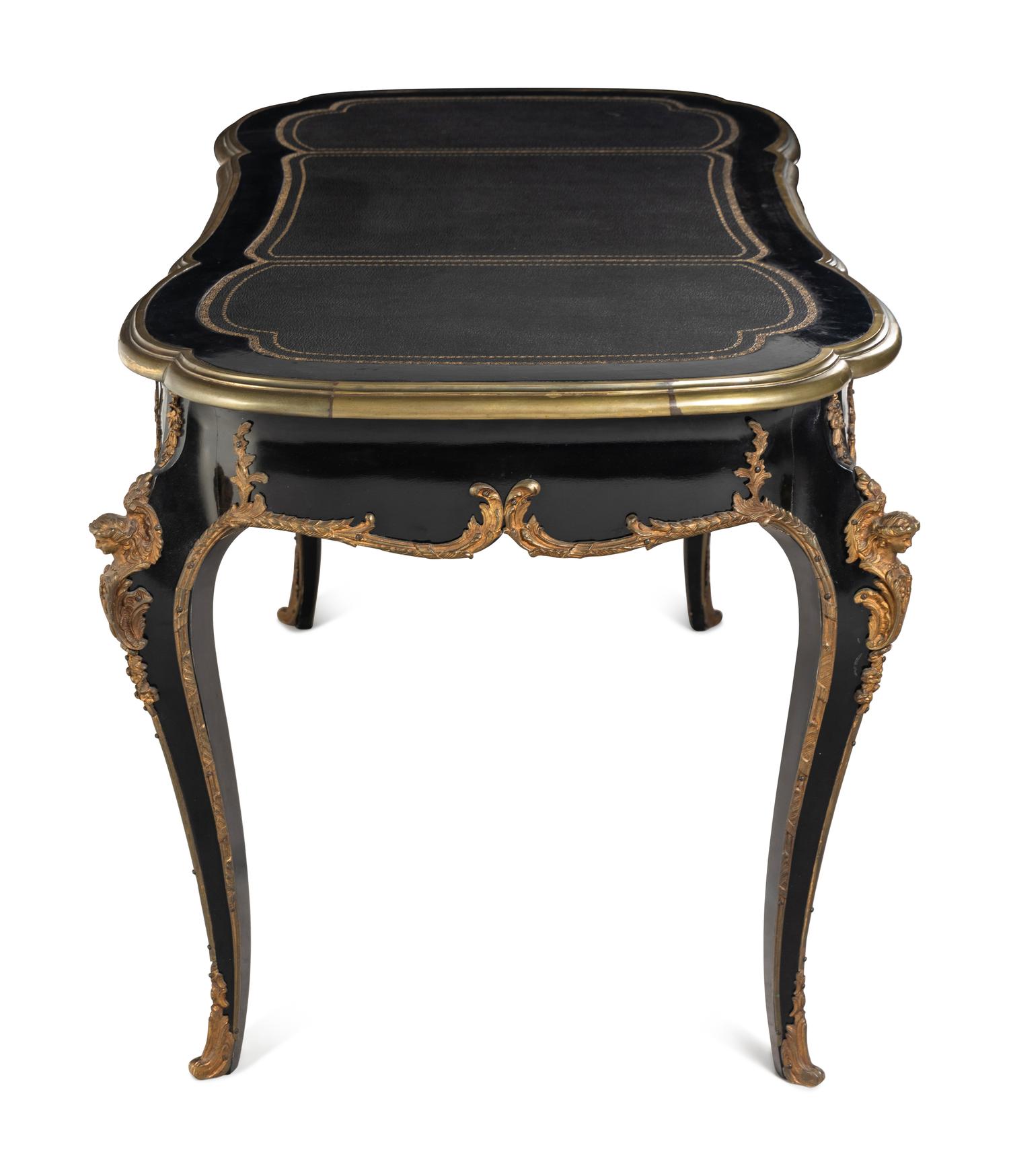 A Louis XV Style Gilt-Metal Mounted Ebonized Bureau Plat