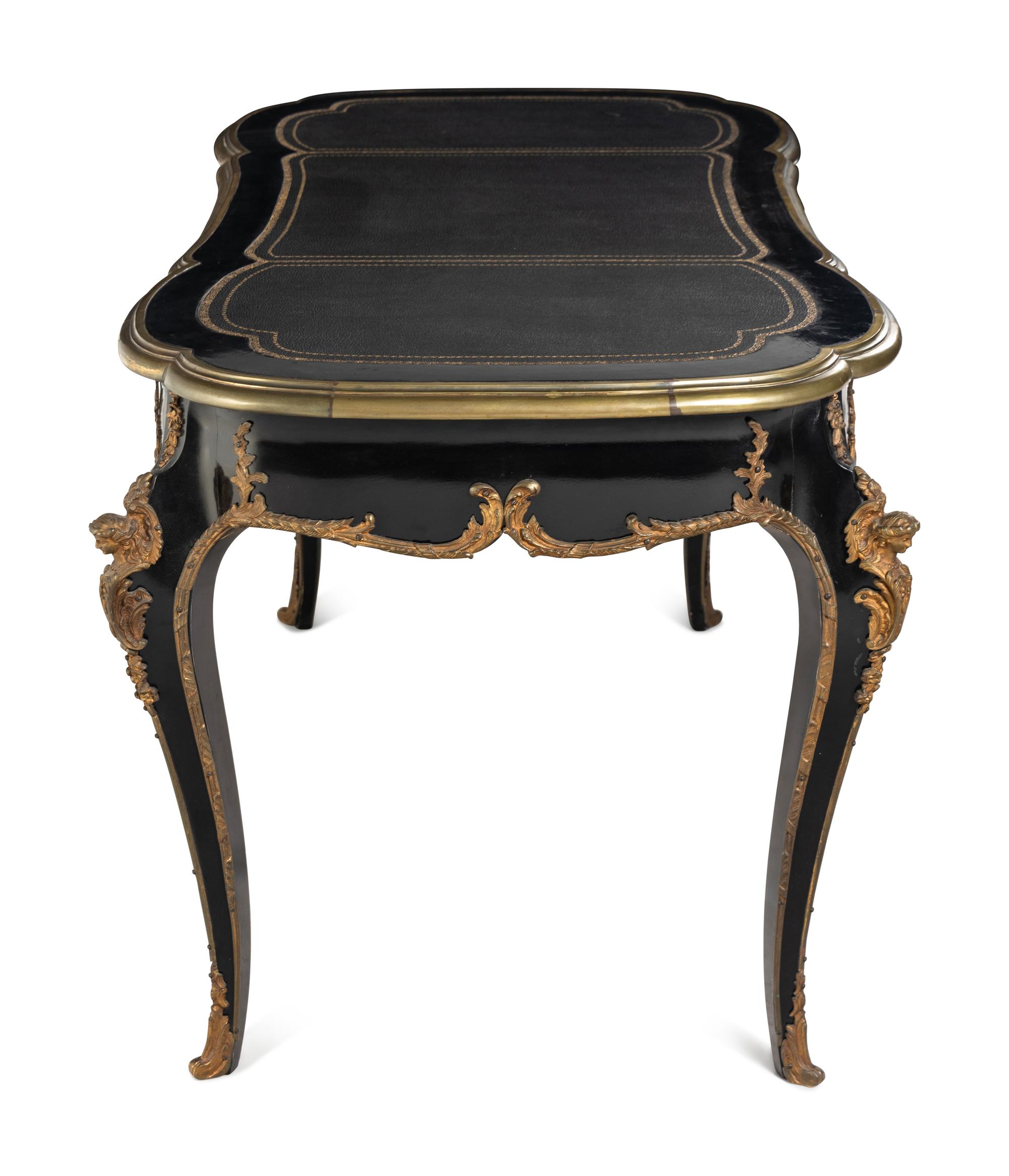 A Louis XV Style Gilt-Metal Mounted Ebonized Bureau Plat
