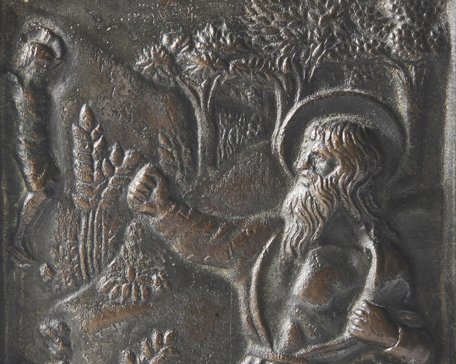 An Italian bronze bas relief pax depicting Saint Jerome in the Wilderness, late 15th century