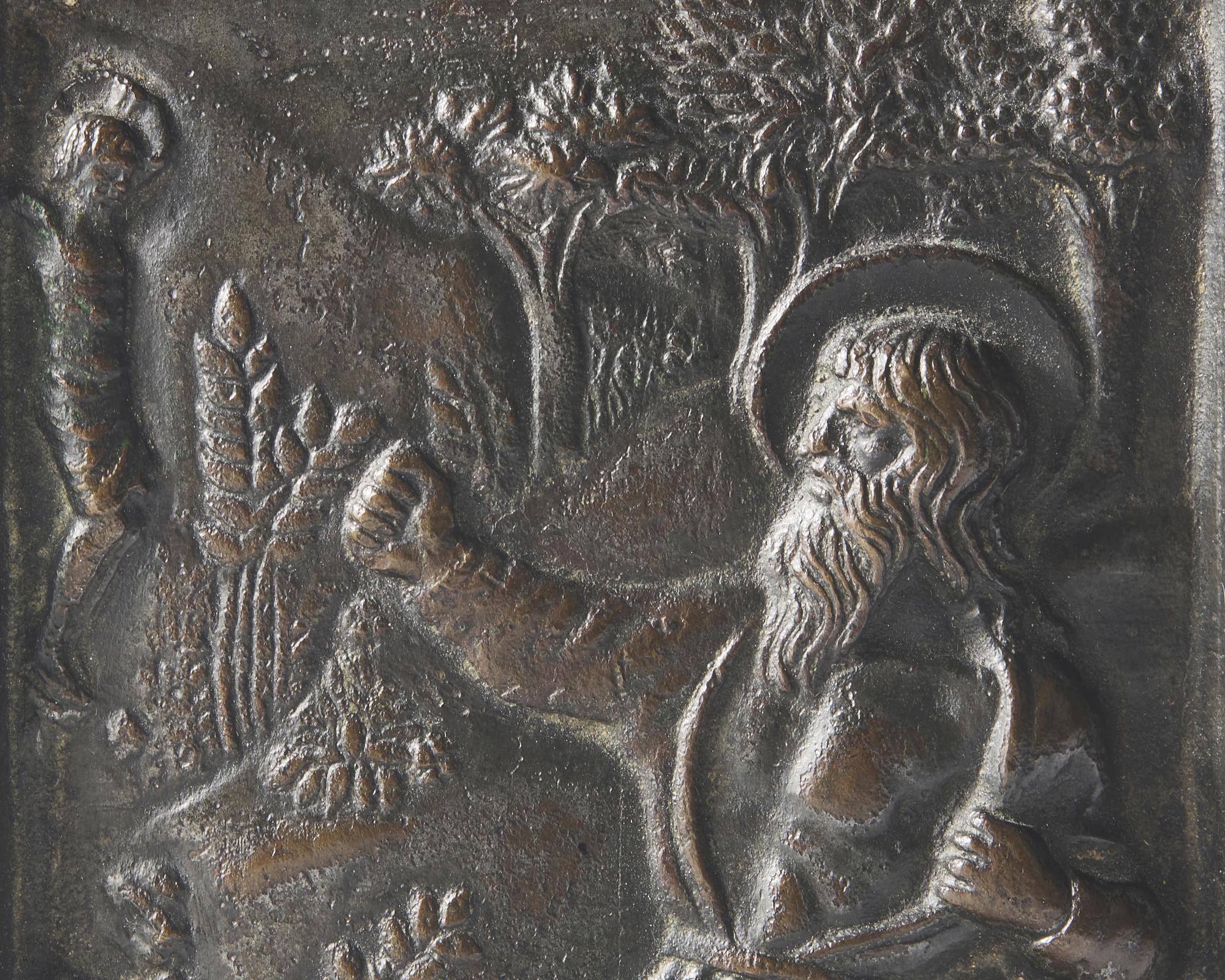 An Italian bronze bas relief pax depicting Saint Jerome in the Wilderness, late 15th century