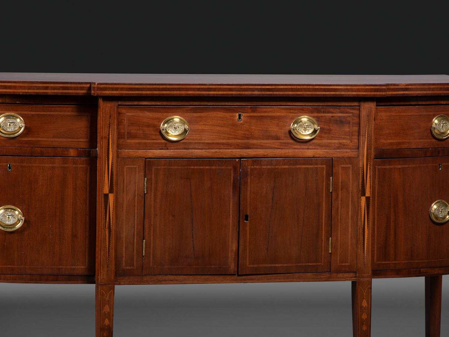 A Federal Inlaid and Figured Mahogany Sideboard