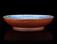 A Carved Blue Glazed Porcelain 'Dragon and Cloud' Plate