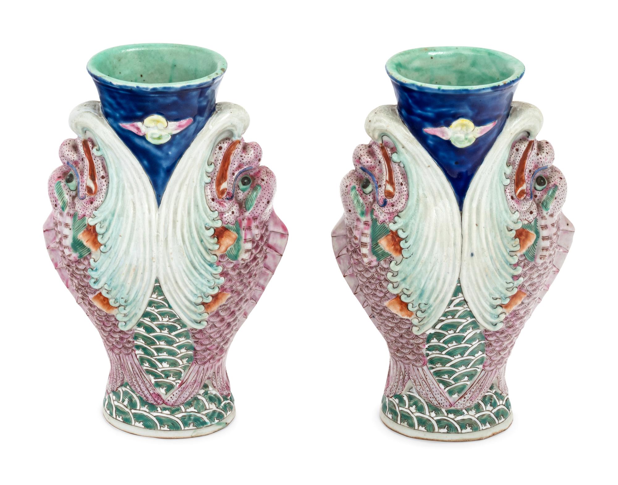A Pair of Chinese Famille Rose 'Capricorns' Porcelain Vases
