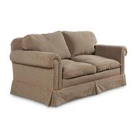 An Edward Ferrell Upholstered Loveseat