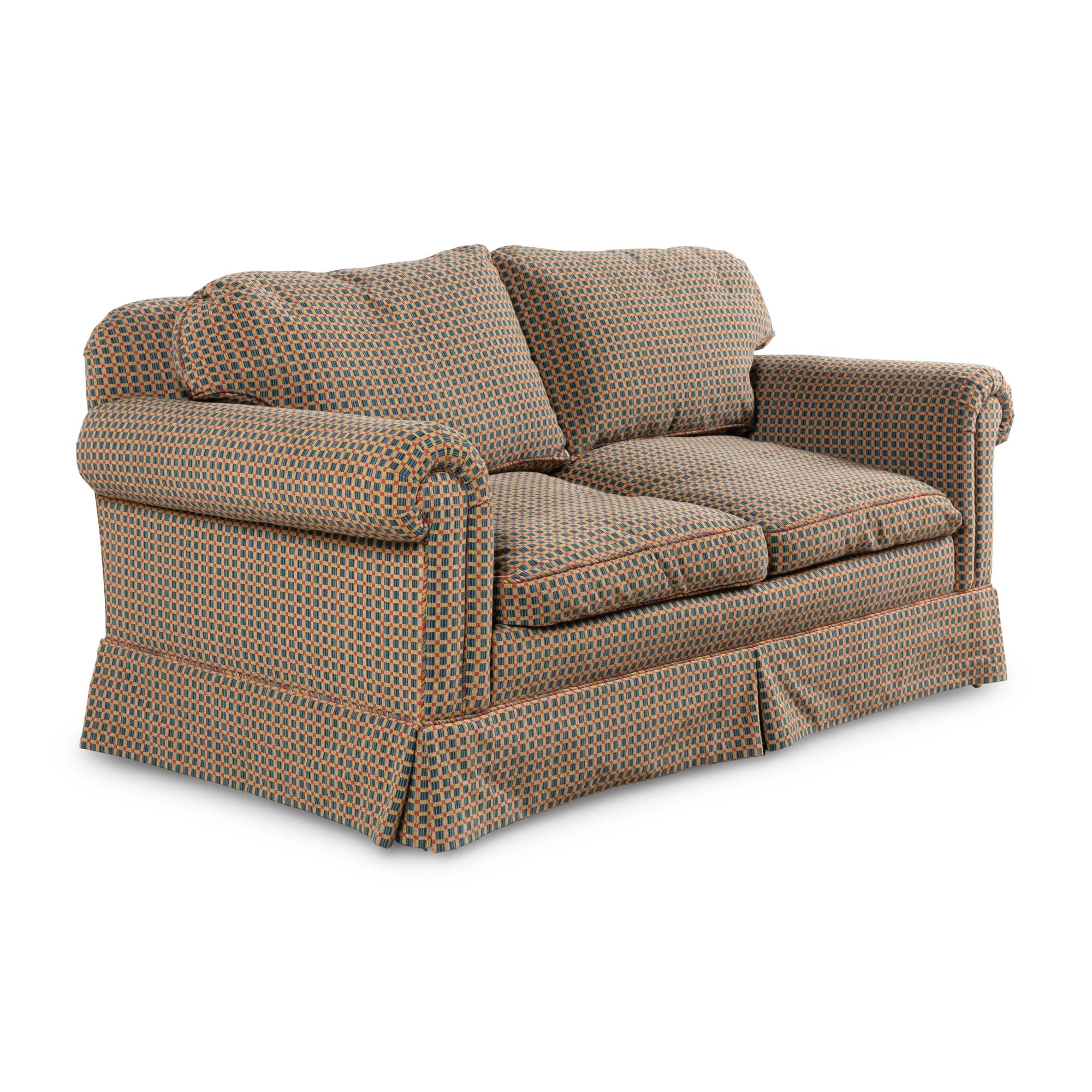 An Edward Ferrell Upholstered Loveseat