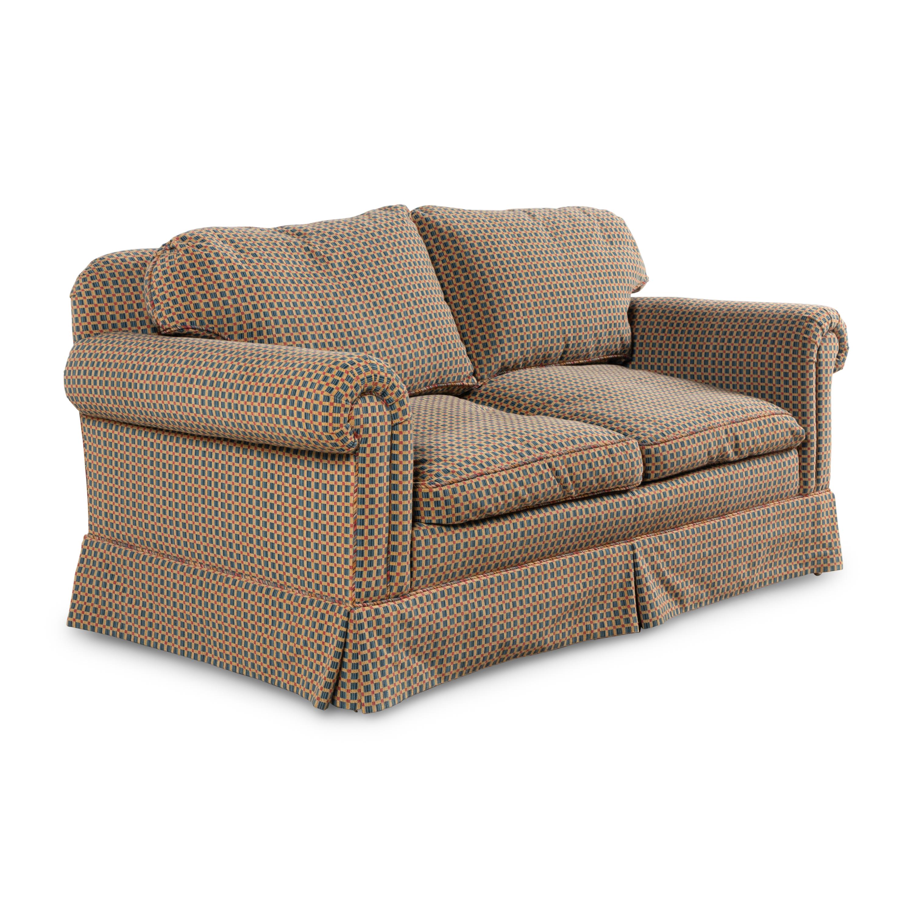 An Edward Ferrell Upholstered Loveseat