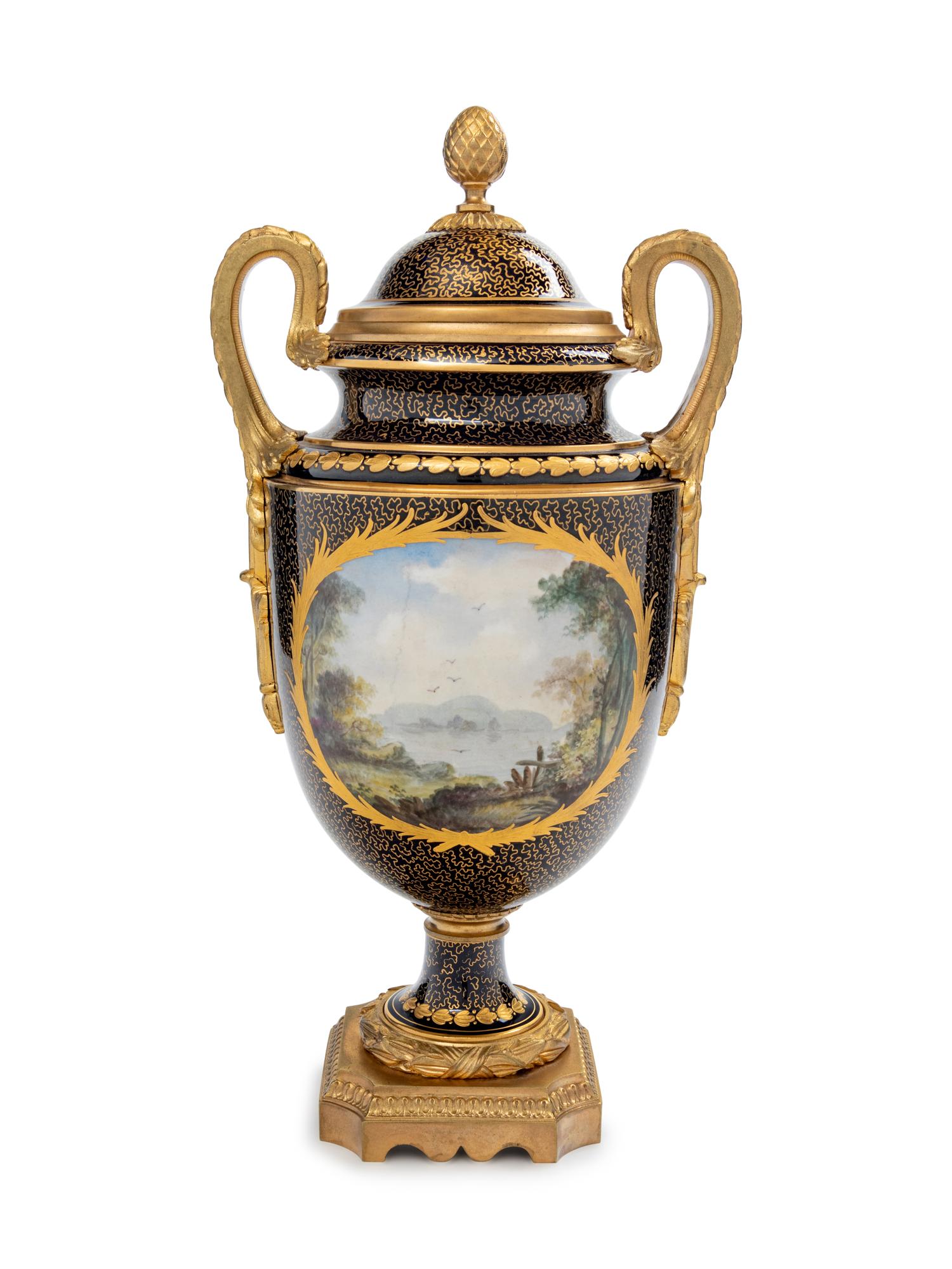 A Sèvres Style Gilt Bronze Mounted Painted and Parcel Gilt Porcelain Covered Urn