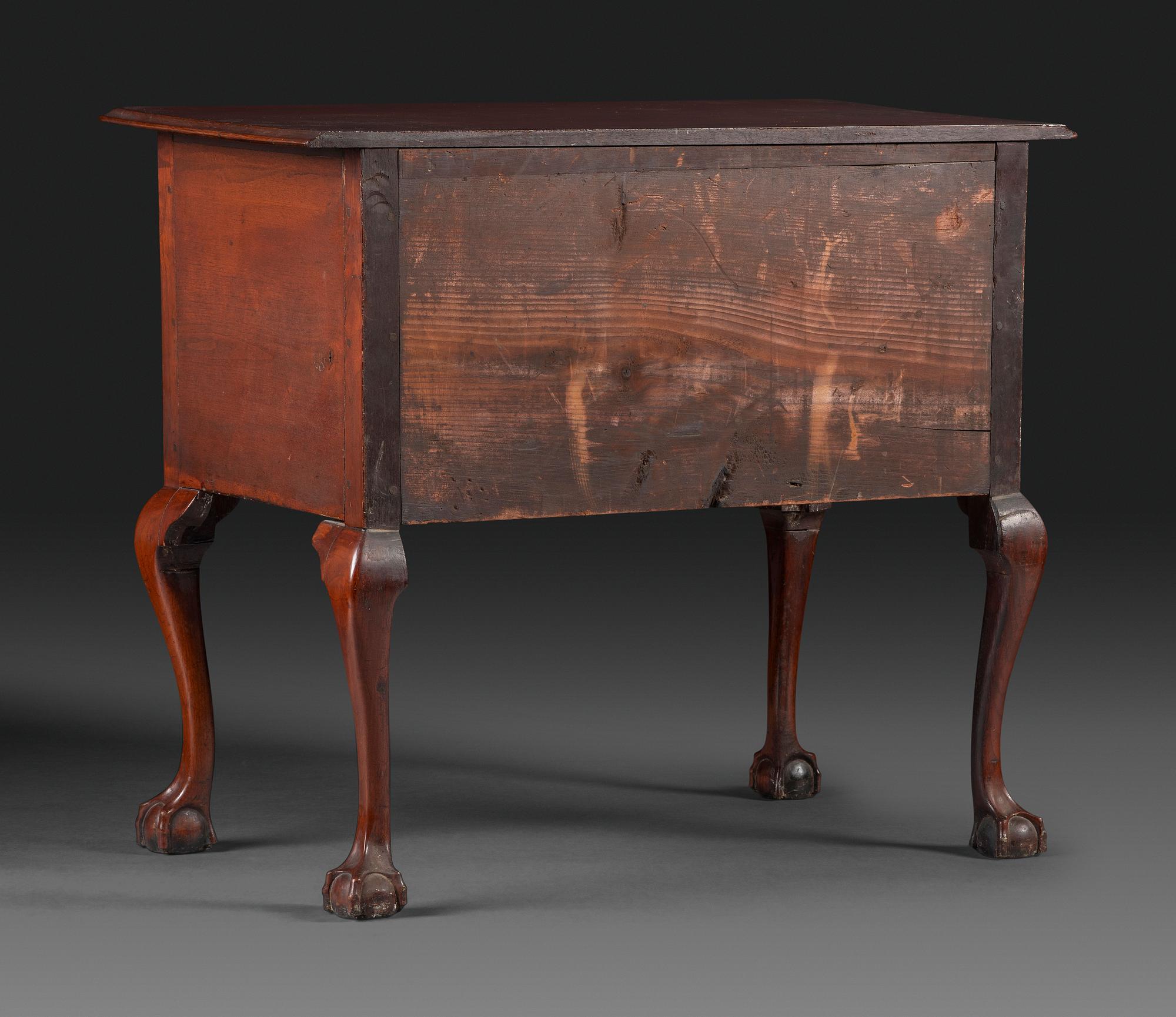 A Chippendale Fan-Carved Walnut Claw-and-Ball Foot Dressing Table