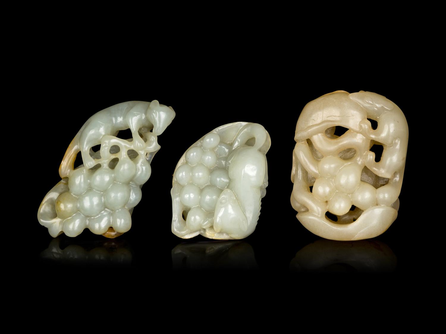 Three Chinese Jade Carvings of 'Squirrel and Grapes'