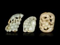 Three Chinese Jade Carvings of 'Squirrel and Grapes'
