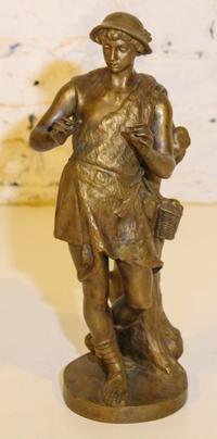 A Continental Bronze Figure. Height 12 3/4 inches.