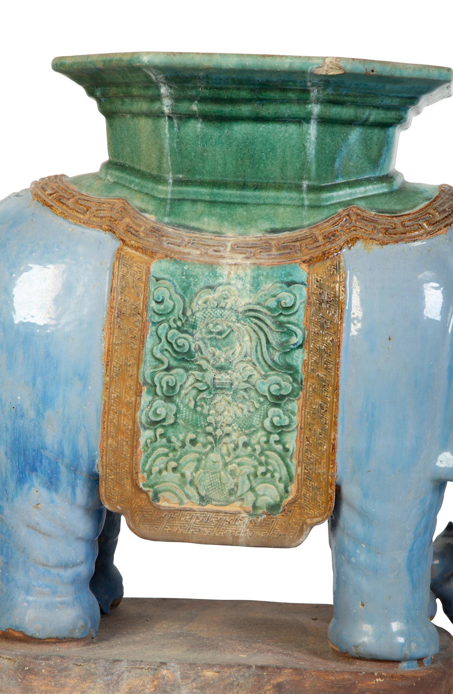A Near Pair of Chinese Ceramic Elephant-Form Garden Stools — 20TH CENTURY