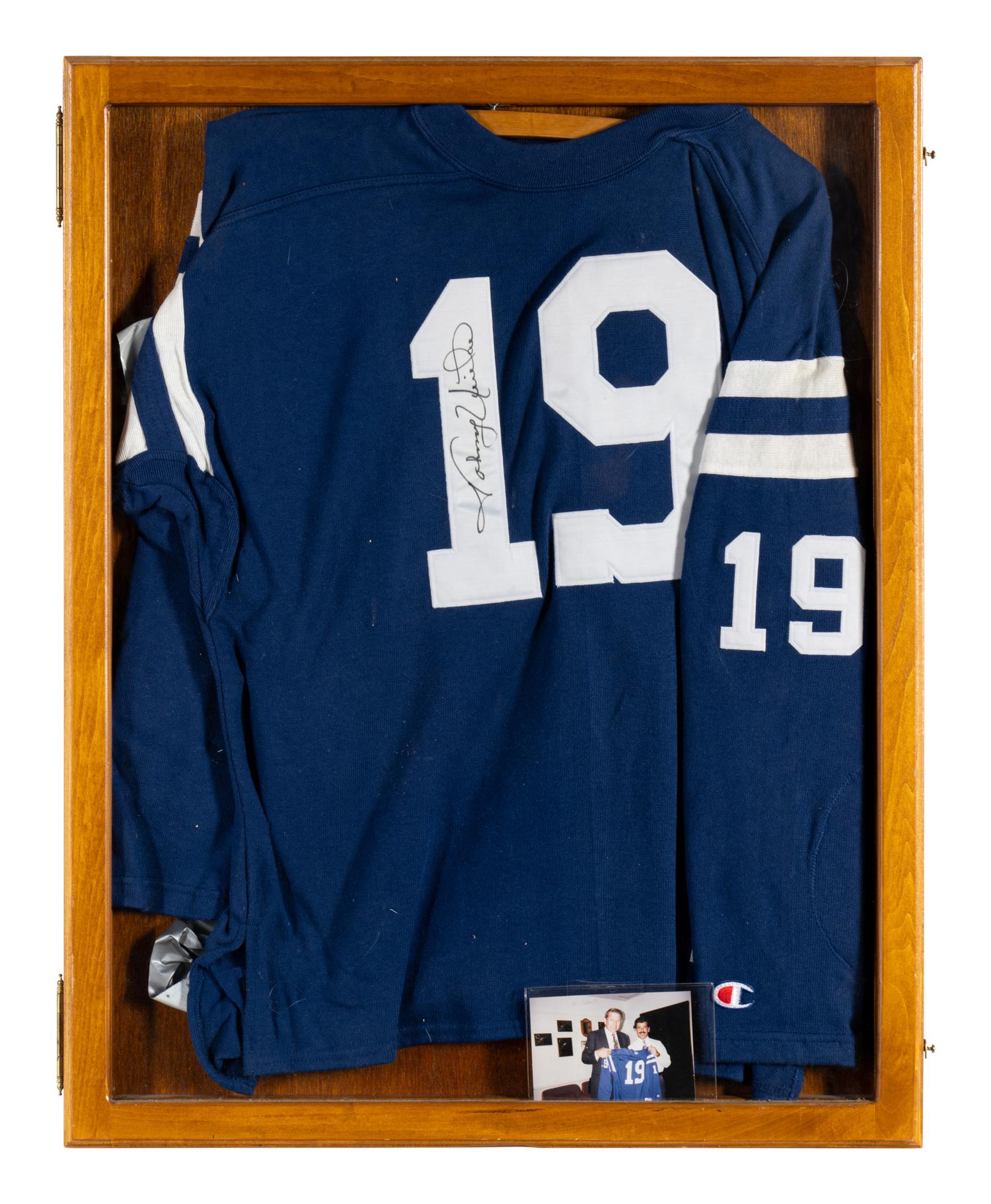 A Johnny Unitas Signed Autograph Baltimore Colts Jersey (With Photo From Signing),