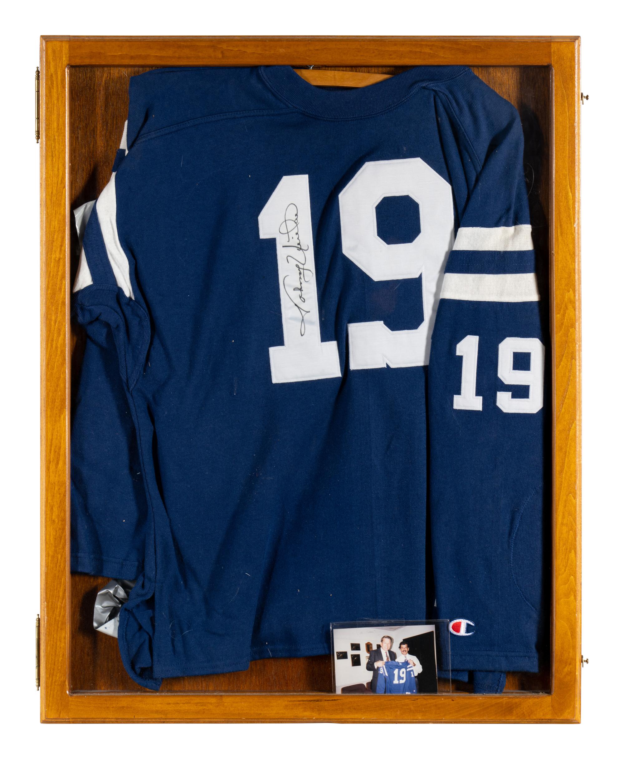 A Johnny Unitas Signed Autograph Baltimore Colts Jersey (With Photo From Signing),