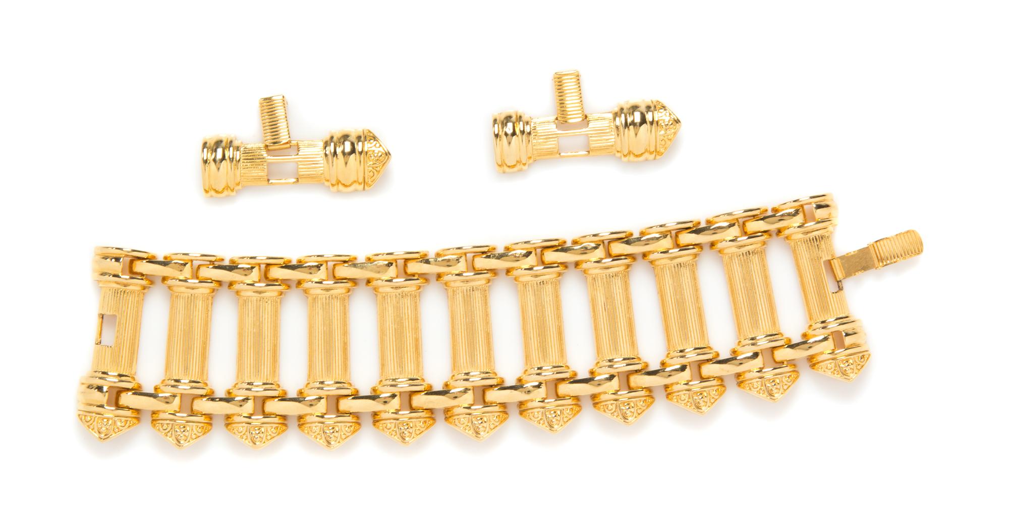 A Kenneth Jay Lane Goldtone Textured Bracelet, 7" x 1 7/8".