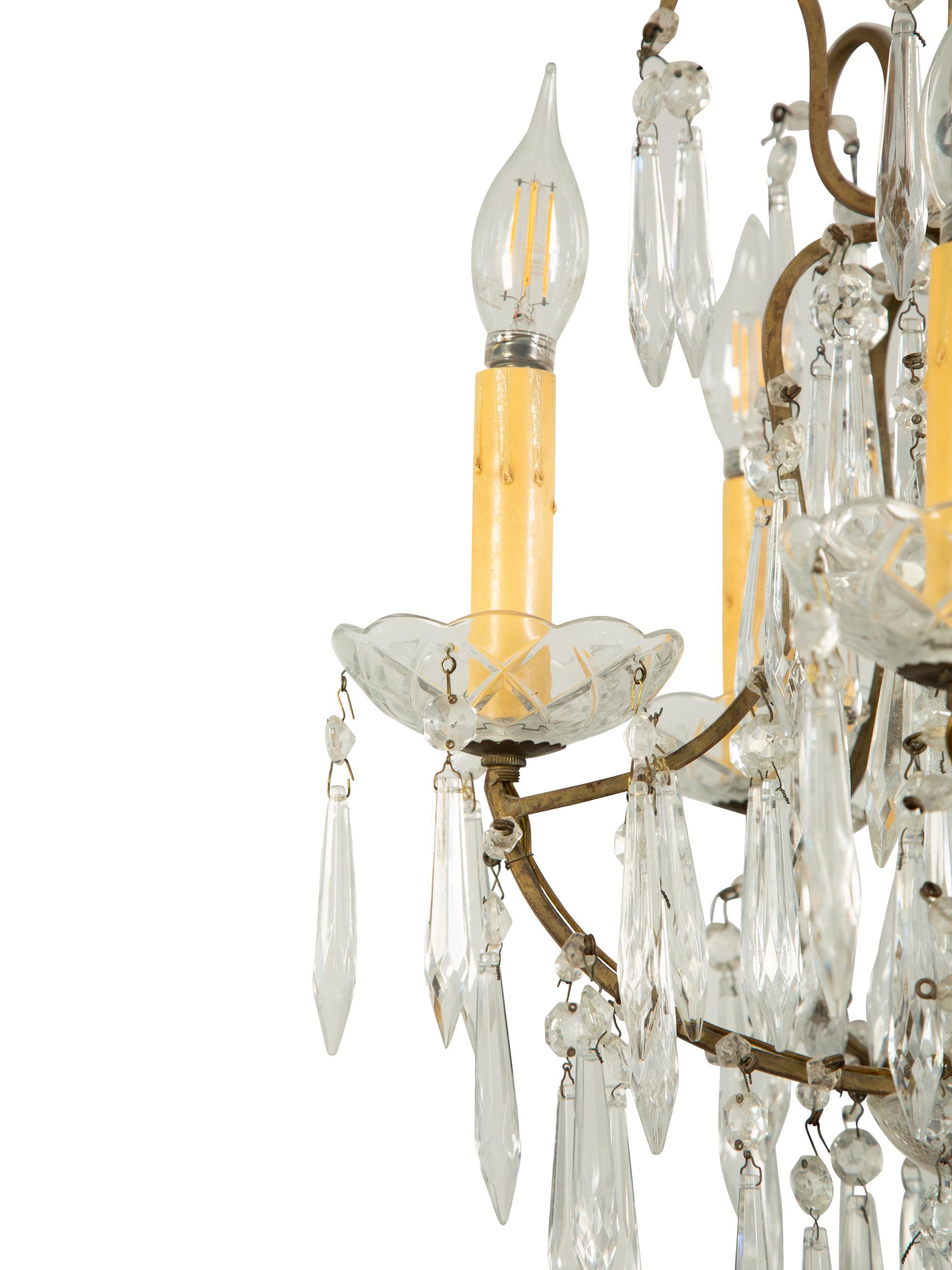 A Gilt Metal and Cut Glass Five-Light Chandelier