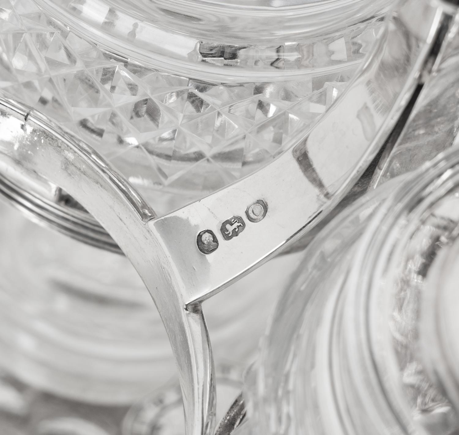 A George III Silver and Cut Glass Cruet Set