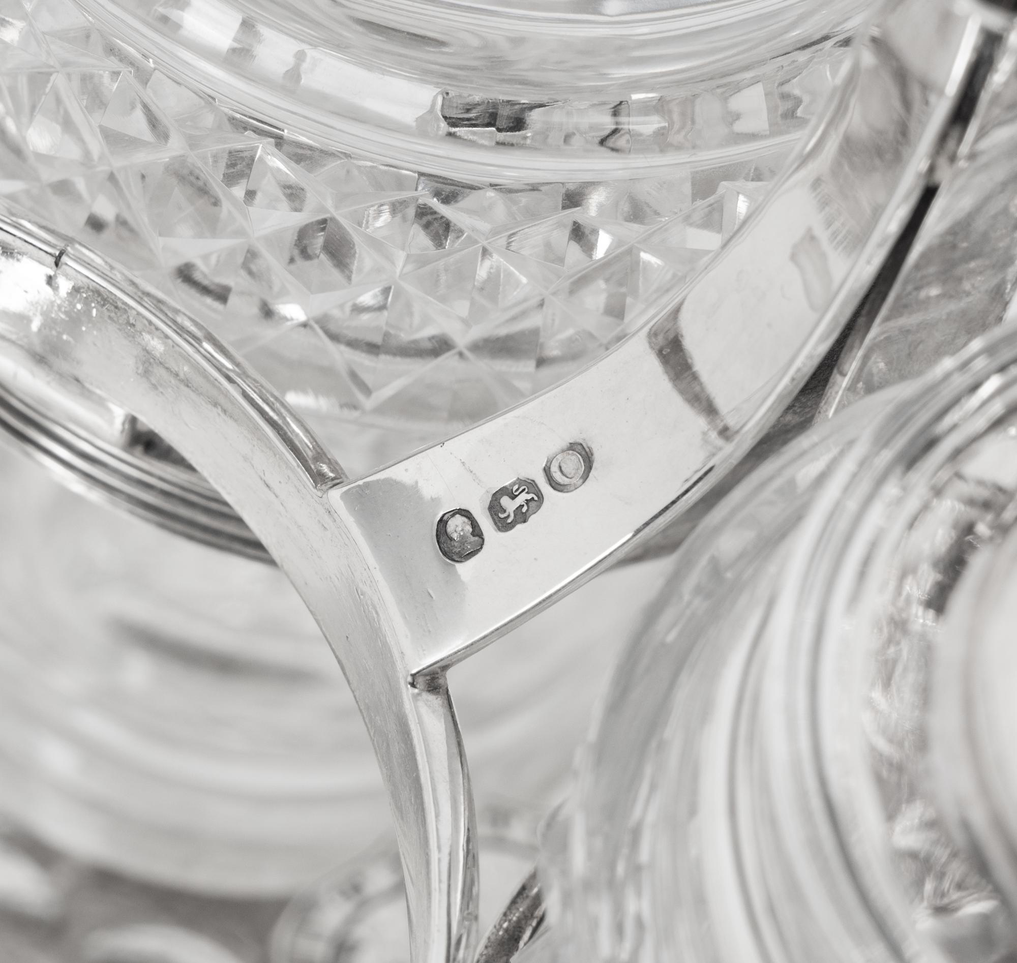 A George III Silver and Cut Glass Cruet Set