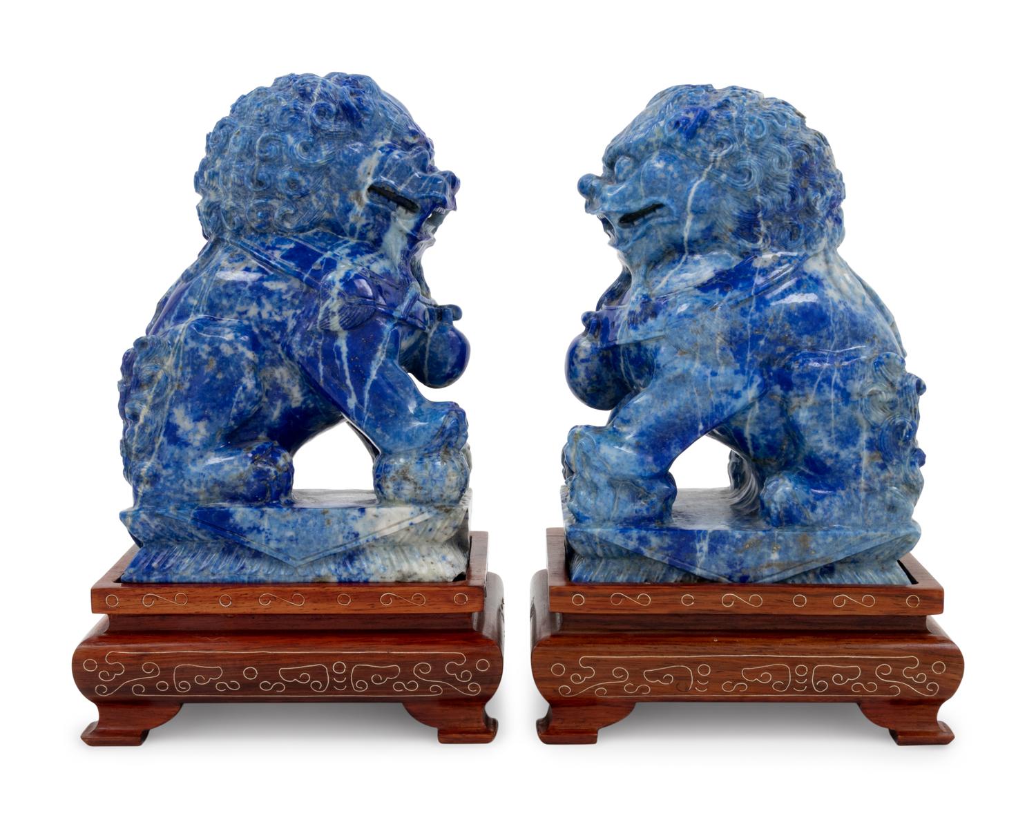 A Pair of Carved Lapis Lazuli Buddhist Lions