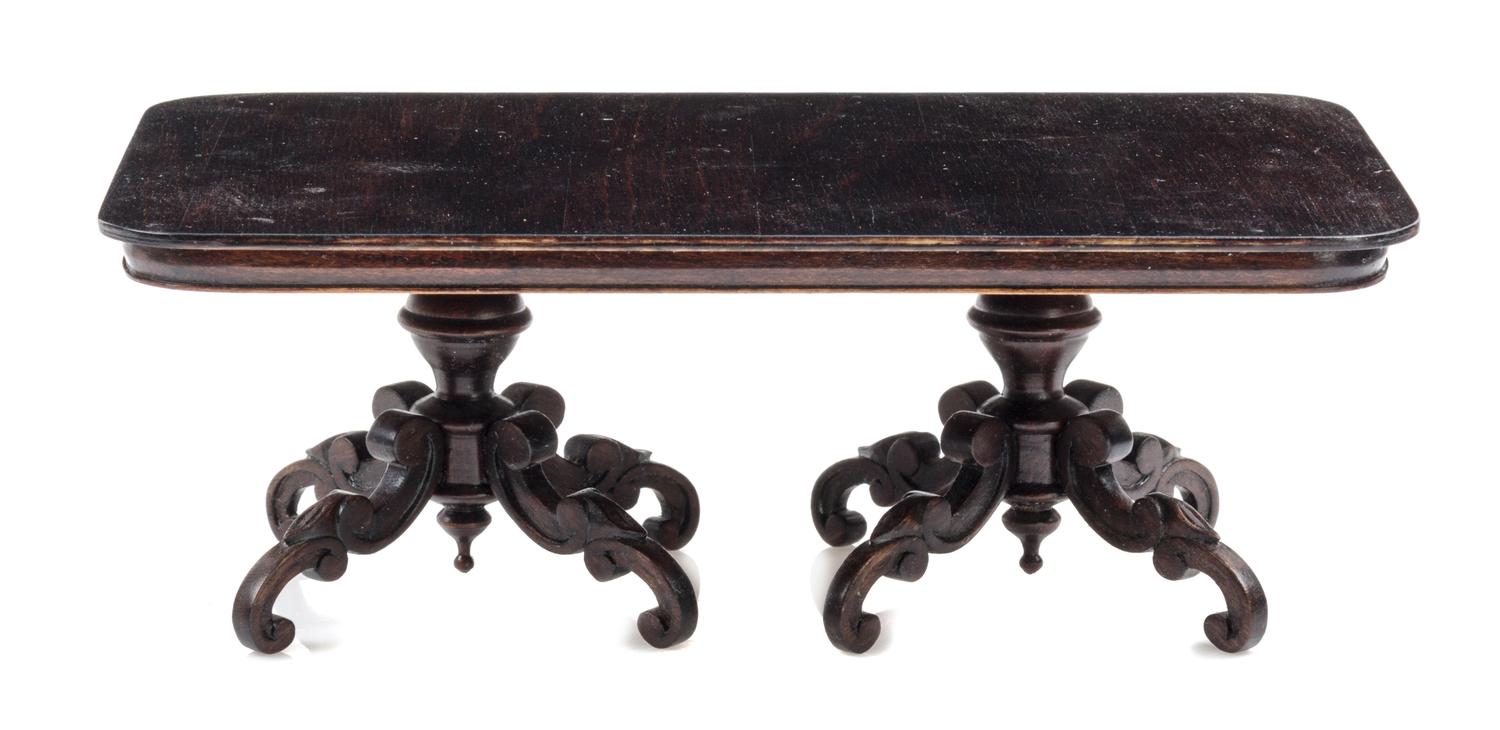 A Baroque Style Mahogany Pedestal Dining Table Height 2 1/2 x width 7 x depth 3 7/8 inches. — Nic Nichols, 1999