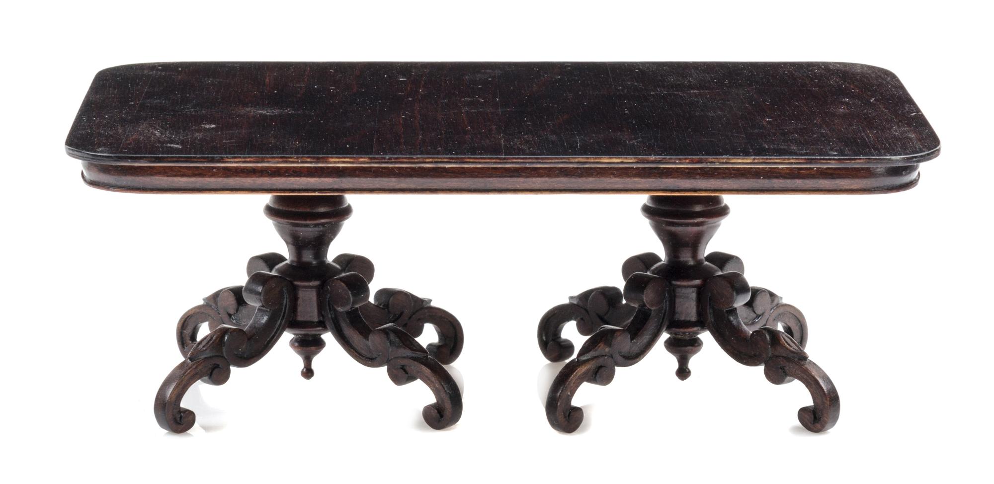 A Baroque Style Mahogany Pedestal Dining Table Height 2 1/2 x width 7 x depth 3 7/8 inches. — Nic Nichols, 1999