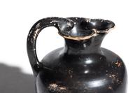 A Greek Black-Glazed Trefoil Oinochoe
