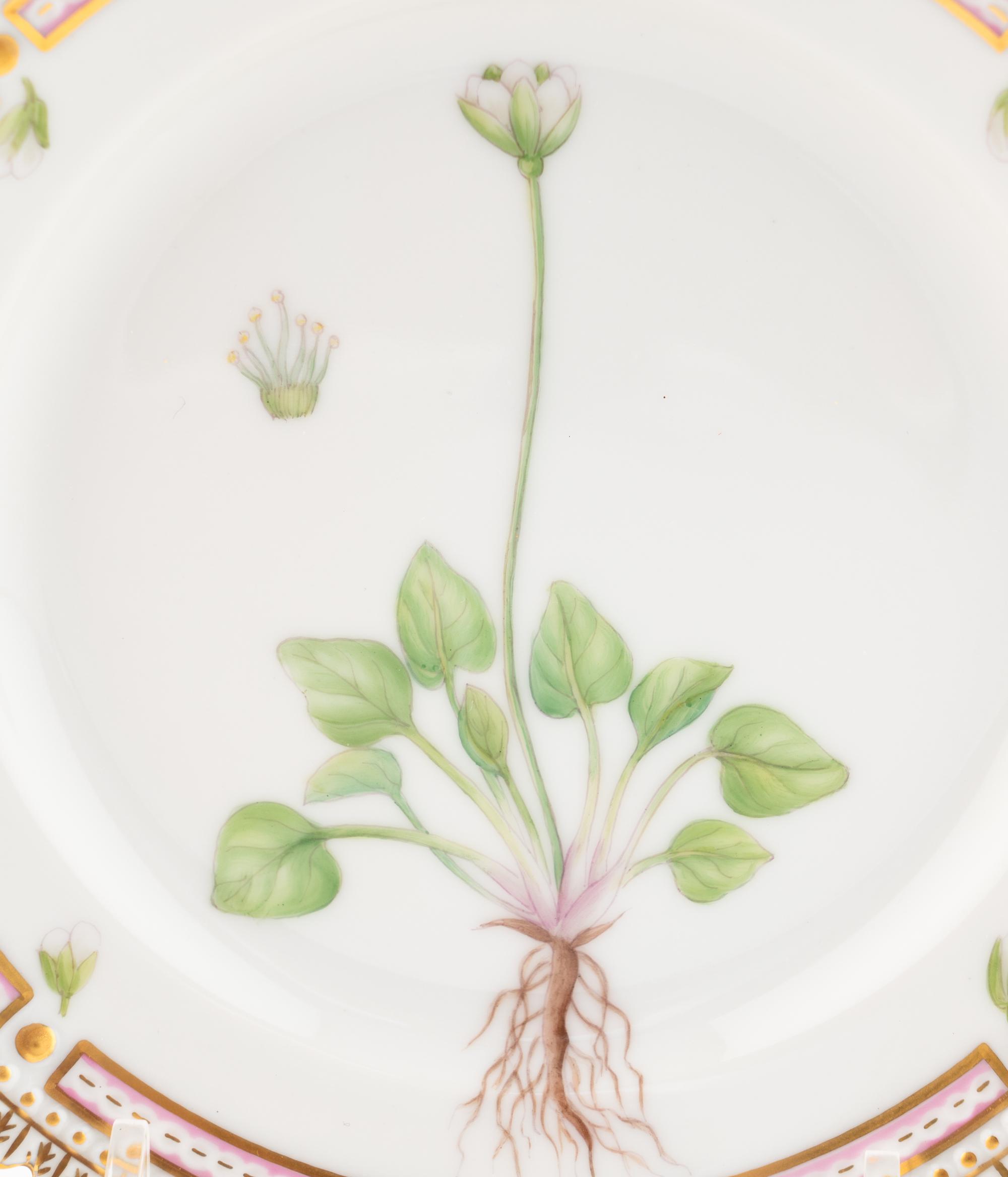 A Set of Eight Royal Copenhagen Flora Danica Porcelain Bread Plates