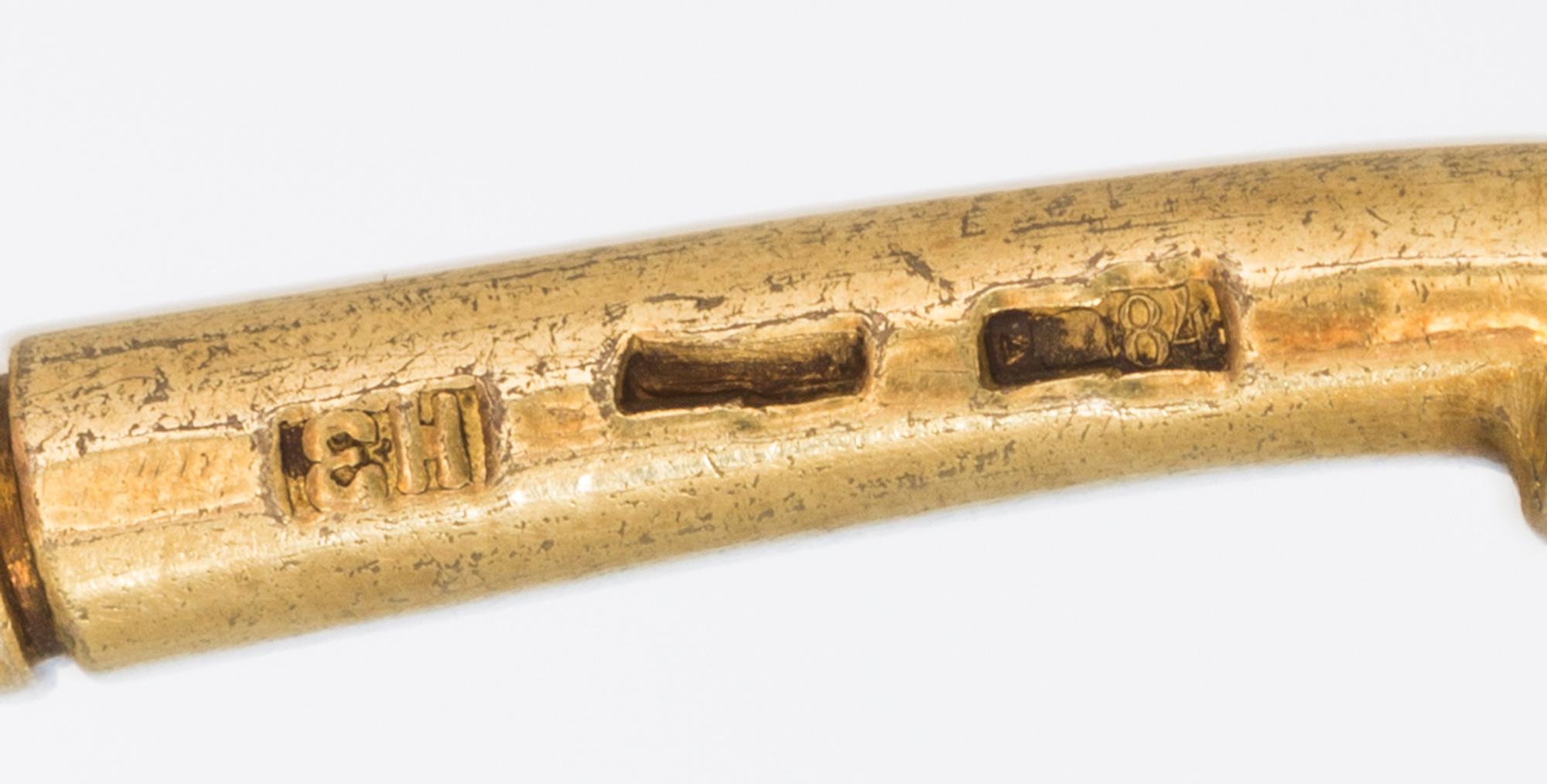 A Russian Silver-Gilt and Enamel Spoon, Mark of Nikolai Zverev, Moscow, early 20th century, having an enameled finial on a twist stem,