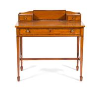 An Edwardian Satinwood Writing Table Height 33 1/2 x width 34 x depth 22 1/4 inches.