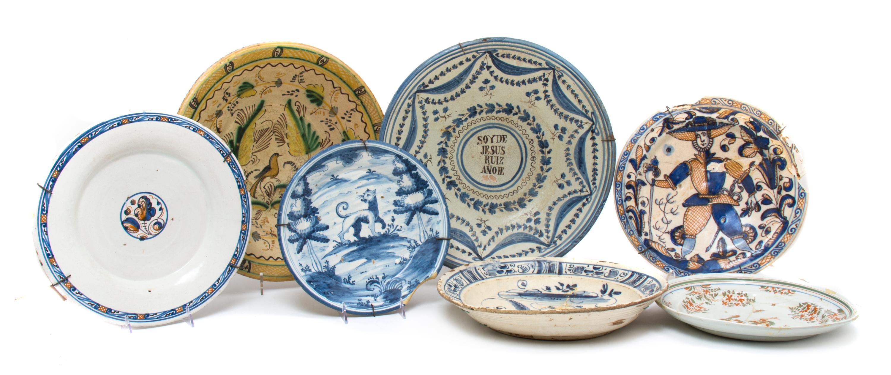 Seven Continental Ceramic Chargers, Diameter of largest 16 3/4 inches.