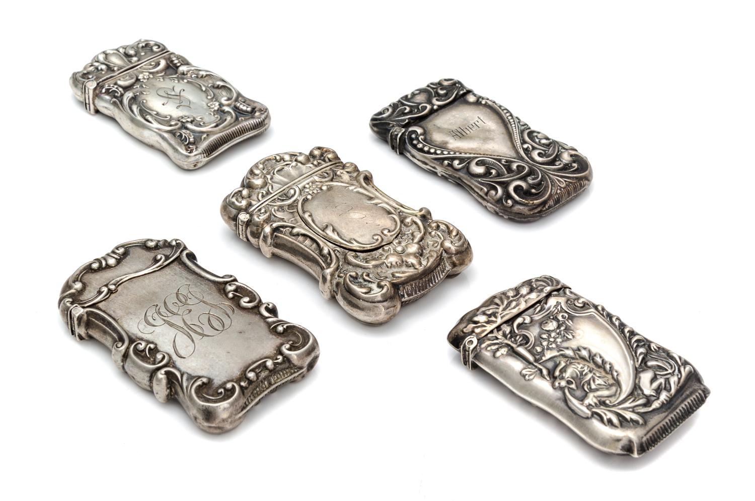 A Collection of Five American Silver Vesta Cases, Various Makers, each case worked to show C-scroll and foliate motifs centered by an e