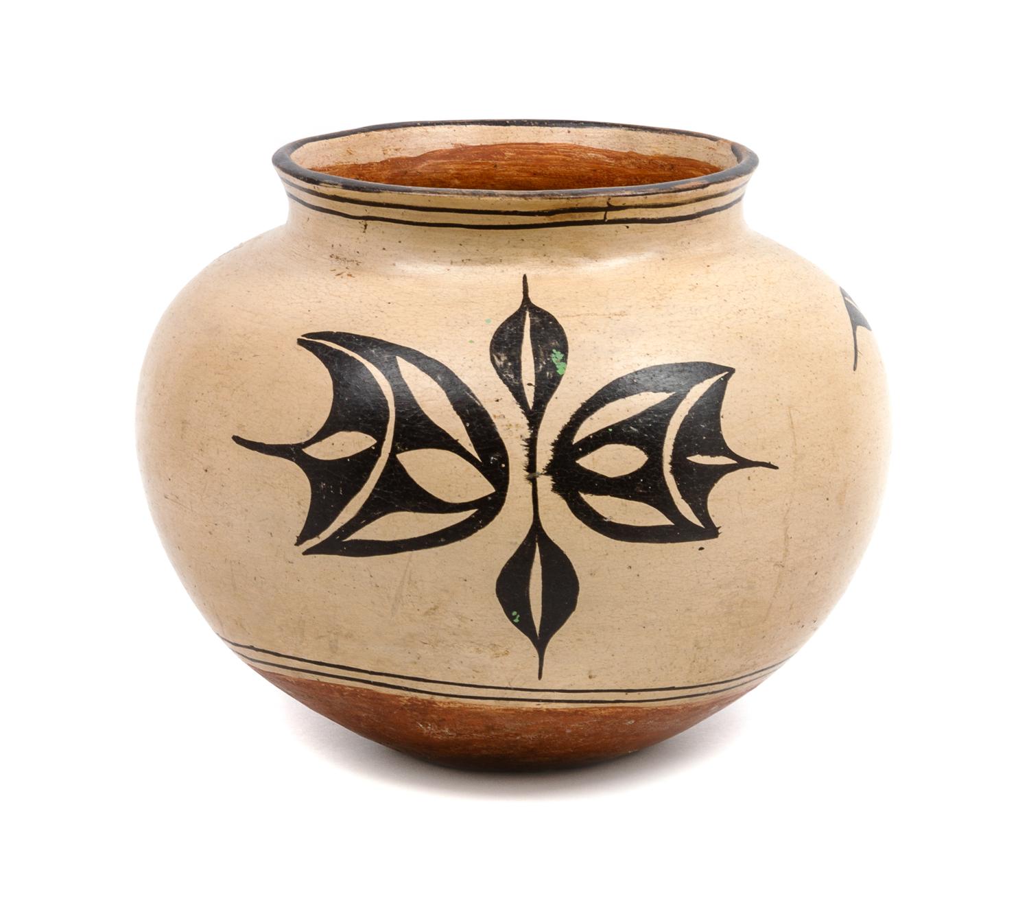 An Acoma Pottery Vase Height 9 x diameter 11 inches.